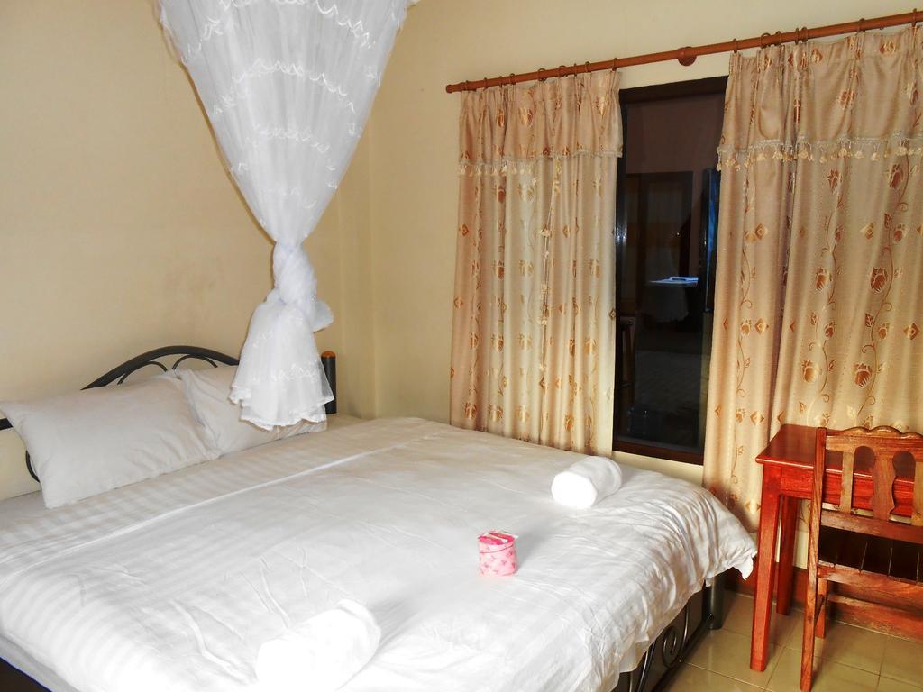 Jammee Guesthouse Ванг Виенг Стая снимка